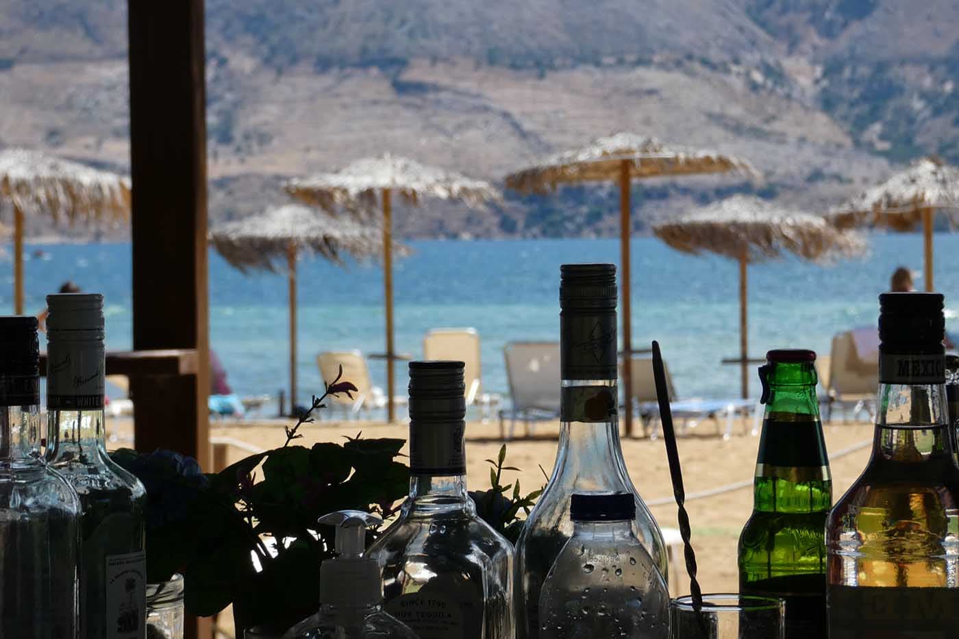 Bottles and cocktail fixings at the beach club bar