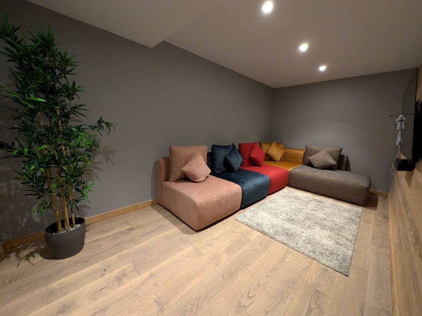 Open-plan lounge at Chalet Sika with fireplace