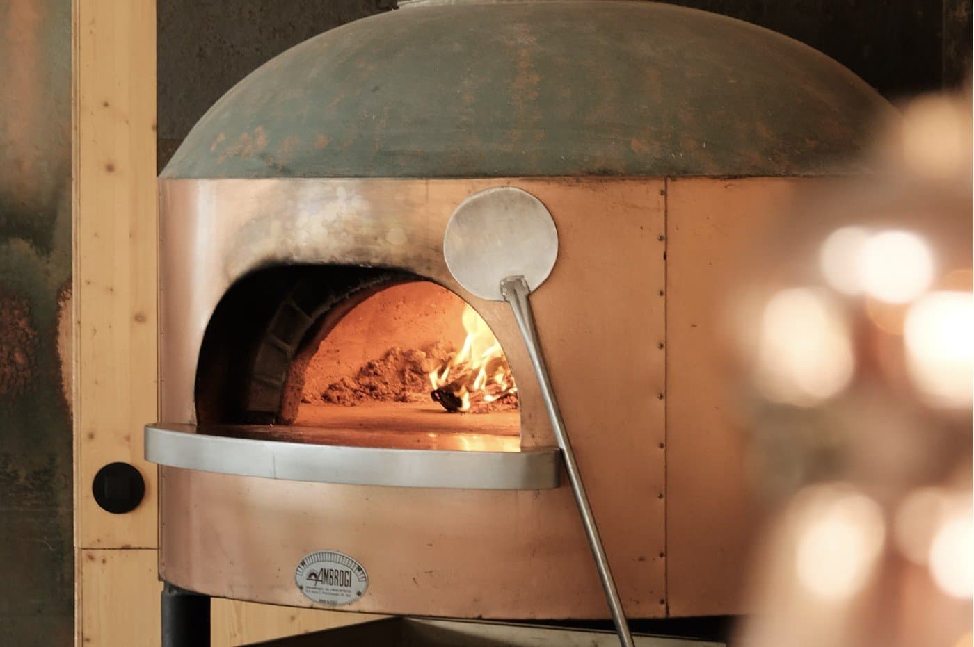 Brass pizza oven at Feel Viana